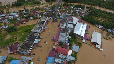The buildings were submerged after heavy rain caused flooding in Bengkulu on the Indonesian island of Sumatra on Saturday, April 27, 2019. (Diva Marha / AFP / Getty Images)