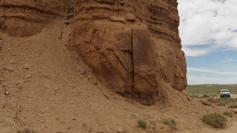 Vandals scratched a drawing of an eye in a monolith at the Temple of the Moon in Capitol Reef National Park's Cathedral Valley in south-central Utah. (Capitol Reef National Park)