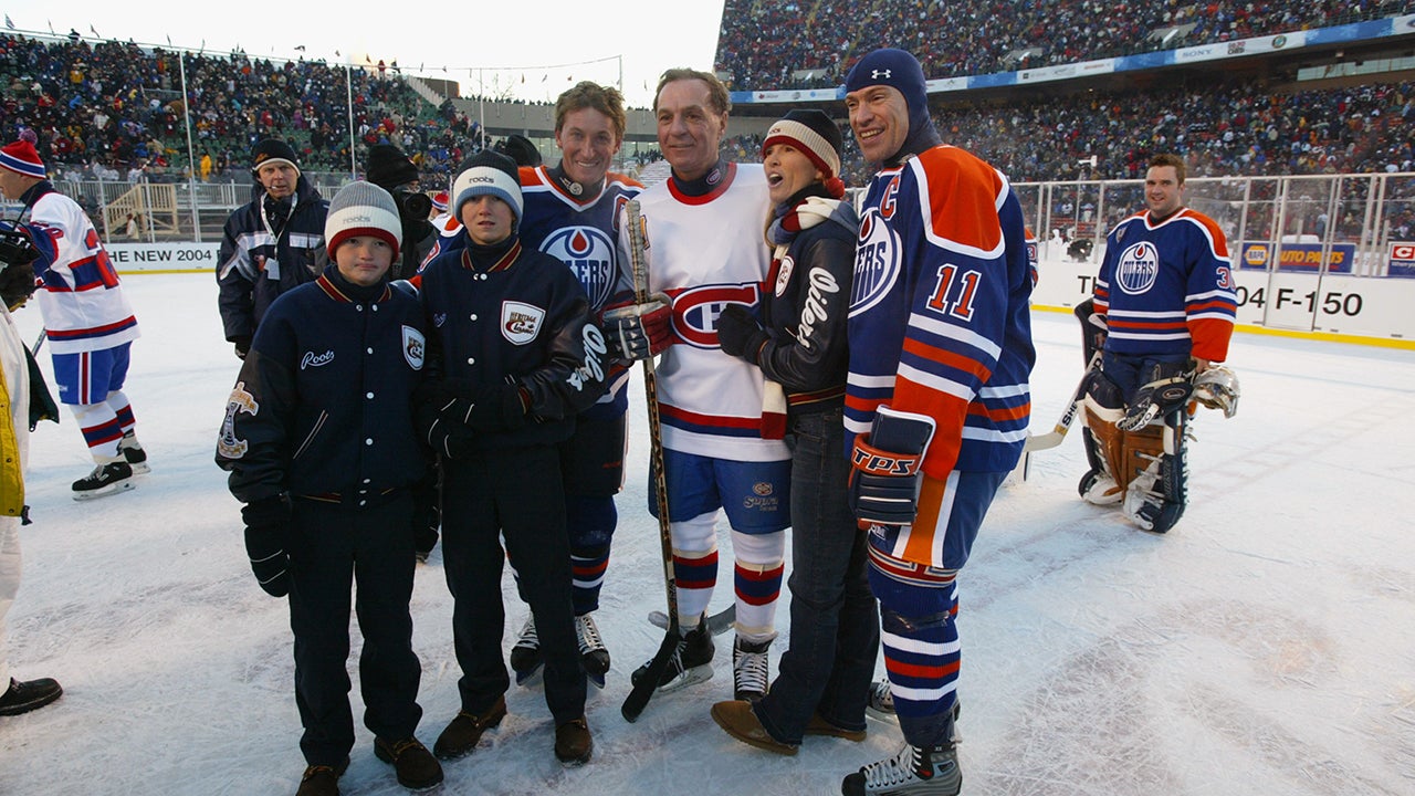 EDMONTON, CANADA - NOVEMBER 22:  Wayne Gretzky #99 and Mark Messier #11 of the Edmonton Oilers and Guy Lafleur #10 of the Montreal Canadiens pose for a picture with Janet Gretzky and her two sons after the Molson Canadien Heritage Classic Megastars Game on November 22, 2003 at Commonwealth Stadium in Edmonton, Canada. (Photo by Jeff Vinnick/Getty Images)