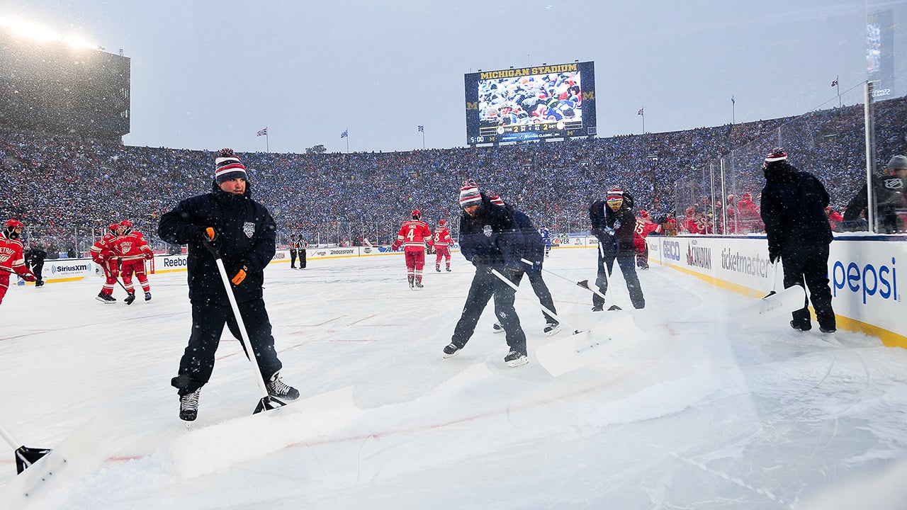 January 1, 2013 - Ann Arbor, MI The snow crew clears the ice in the shootout period of the 2014 Bridgestone NHL Winter Classic at Michigan Stadium in Ann Arbor, Michigan. Bridgestone NHL Winter Classic - Maple Leafs v Red Wings (Photo by Steven King/Icon SMI/Corbis/Icon Sportswire via Getty Images)