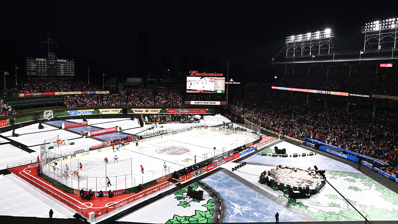 CHICAGO, ILLINOIS - DECEMBER 31: In an aerial view players are seen skating during the first period of the Discover NHL Winter Classic between the St. Louis Blues and the Chicago Blackhawks at Wrigley Field on December 31, 2024 in Chicago, Illinois. (Photo by Jamie Sabau/NHLI via Getty Images)