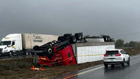The driver of this semi truck was injured when it overturned in heavy weather near Calera, Oklahoma on Friday, November 4, 2022. (Brett Graham)