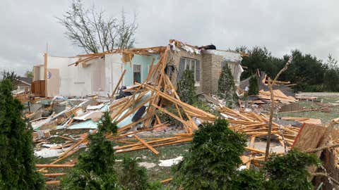 Damage is seen at a home after a tornado came through the area in Gaylord, Mich., Friday, May 20, 2022. (AP Photo/John Flesher)