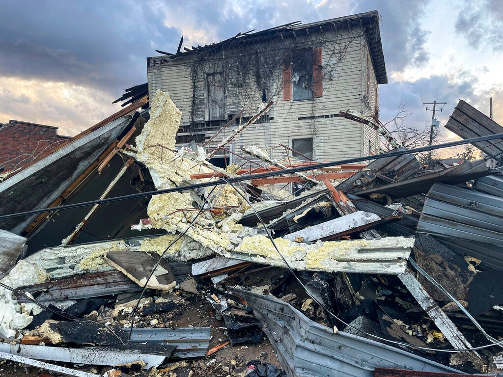 A damaged structure and debris are seen in the aftermath of severe weather, Thursday, Jan. 12, 2023, in Selma, Ala. A large tornado damaged homes and uprooted trees in Alabama on Thursday as a powerful storm system pushed through the South. (AP Photo/Butch Dill)