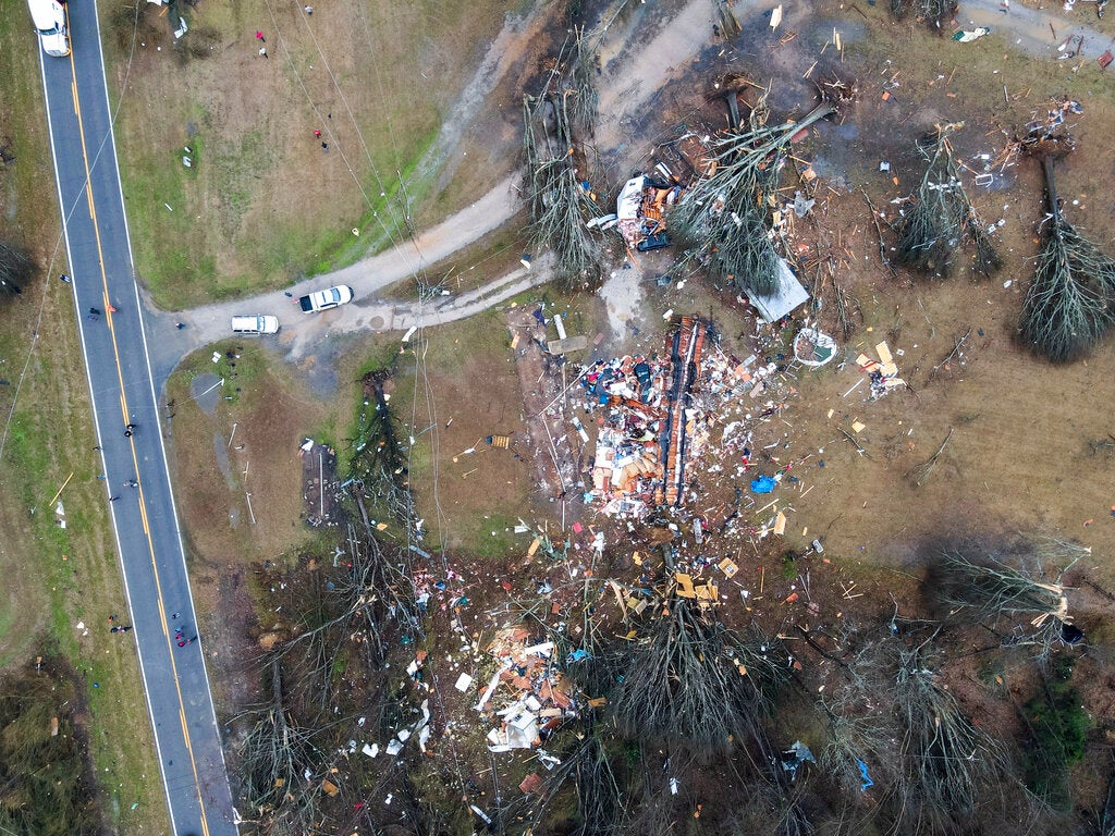Devastation is seen in the aftermath from severe weather, Thursday, Jan. 12, 2023, Greensboro, Ala. A giant, swirling storm system billowing across the South spurred a tornado on Thursday that shredded the walls of homes, toppled roofs and uprooted trees. (Mike Goodall via AP)