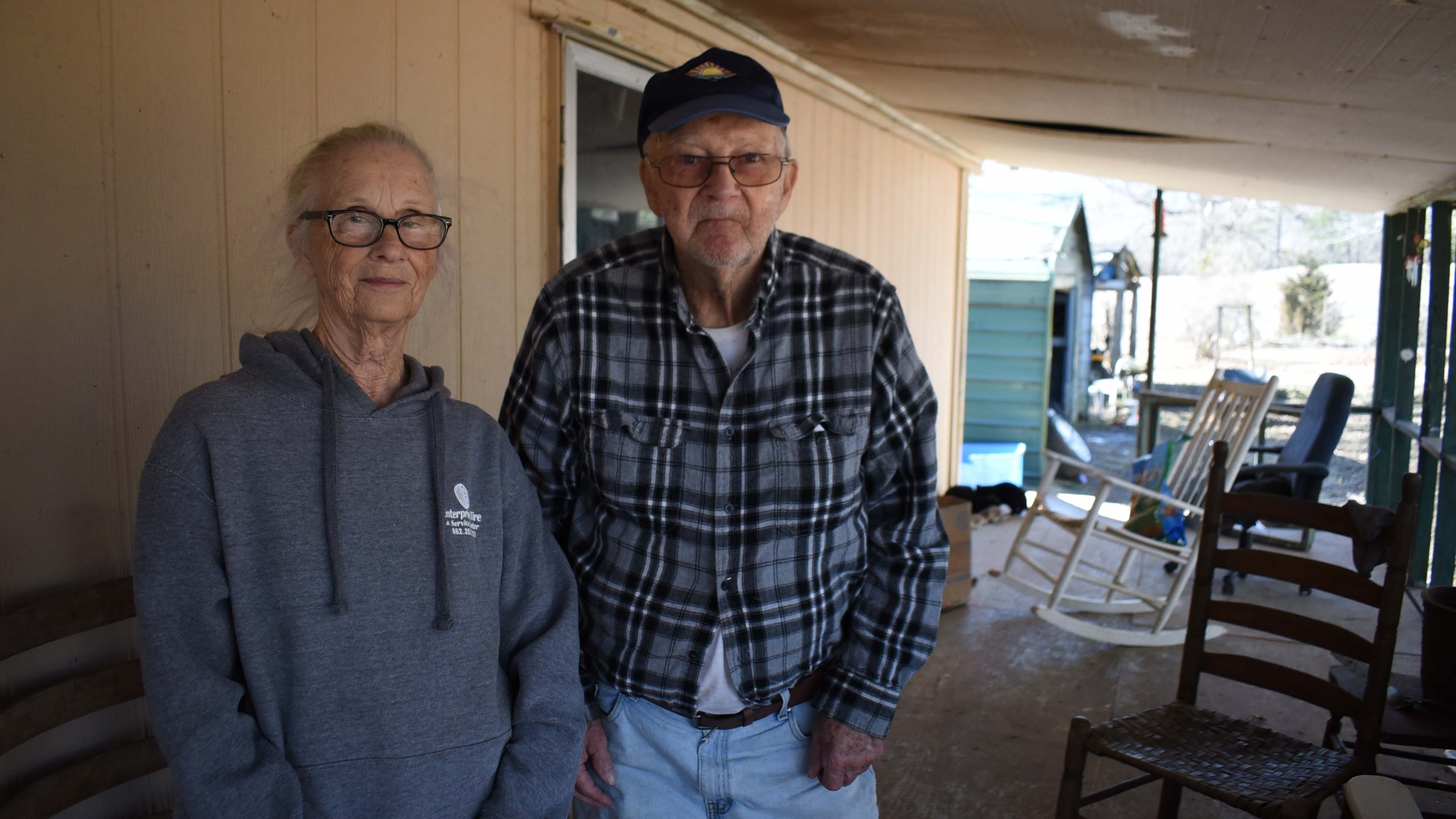 Barbara Bishop, 79, left, and her husband George Bishop, 85, pose for a portrait on their front porch,  Friday, Feb. 6, 2026 in Oxford, Ms. (AP Photo/Sophie Bates)