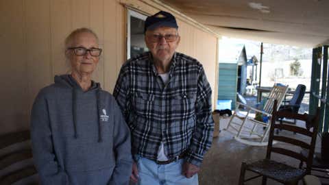 Barbara Bishop, 79, left, and her husband George Bishop, 85, pose for a portrait on their front porch, Friday, Feb. 6, 2026 in Oxford, Ms. (AP Photo/Sophie Bates)