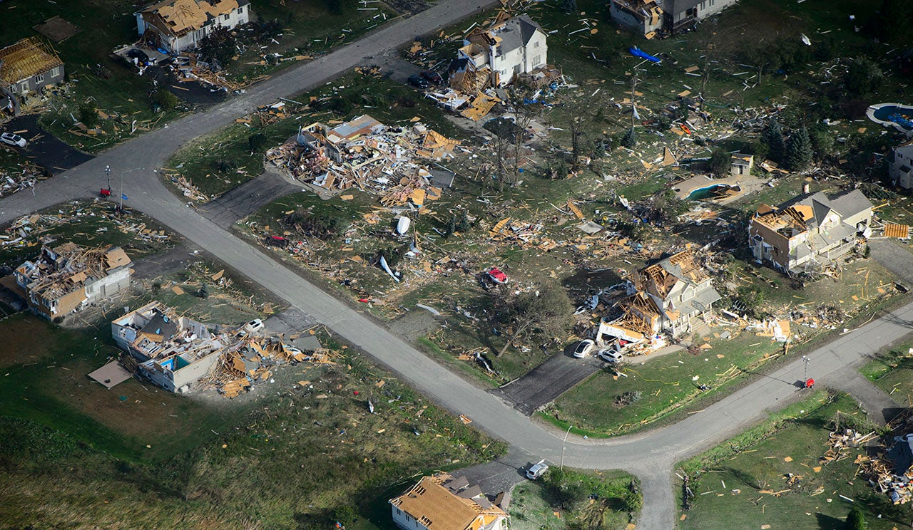 Damage from a tornado is seen in Dunrobin, Ontario, Canada. west of Ottawa, on Saturday, September 22, 2018.  The storm tore roofs off of homes, overturned cars and felled power lines.  (Sean Kilpatrick /The Canadian Press via AP)