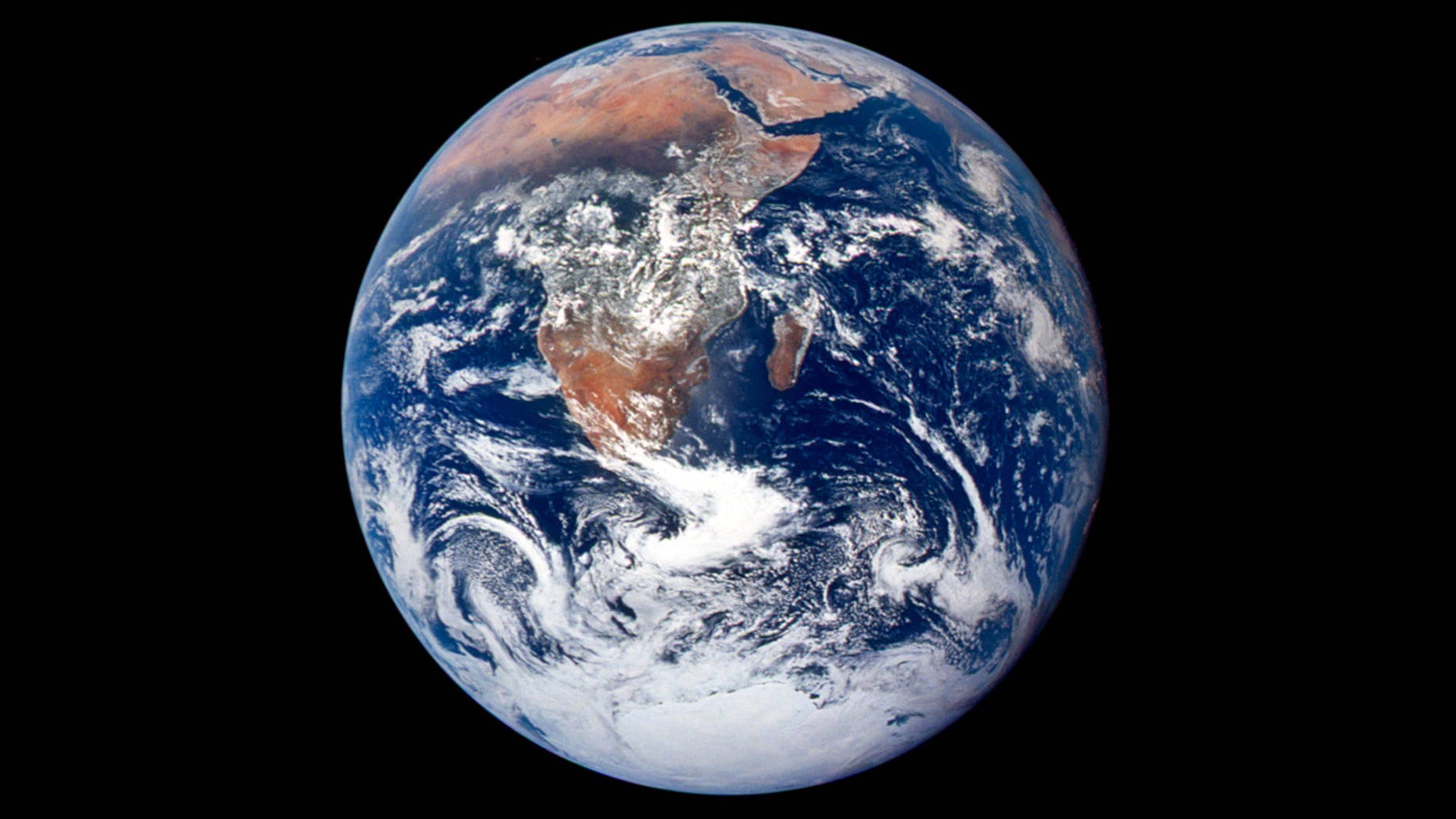 This image is one of the most widely known photographs of Earth, taken by the crew of the final Apollo mission (Apollo 17), as the the crew made its way to the Moon on Dec. 17, 1972. 

NASA writes of the photo &ldquo;Dubbed the &lsquo;Blue Marble,&rsquo; Earth is revealed as both a vast planet home to billions of creatures and a beautiful orb capable of fitting into the pocket of the universe.&rdquo; (NASA)