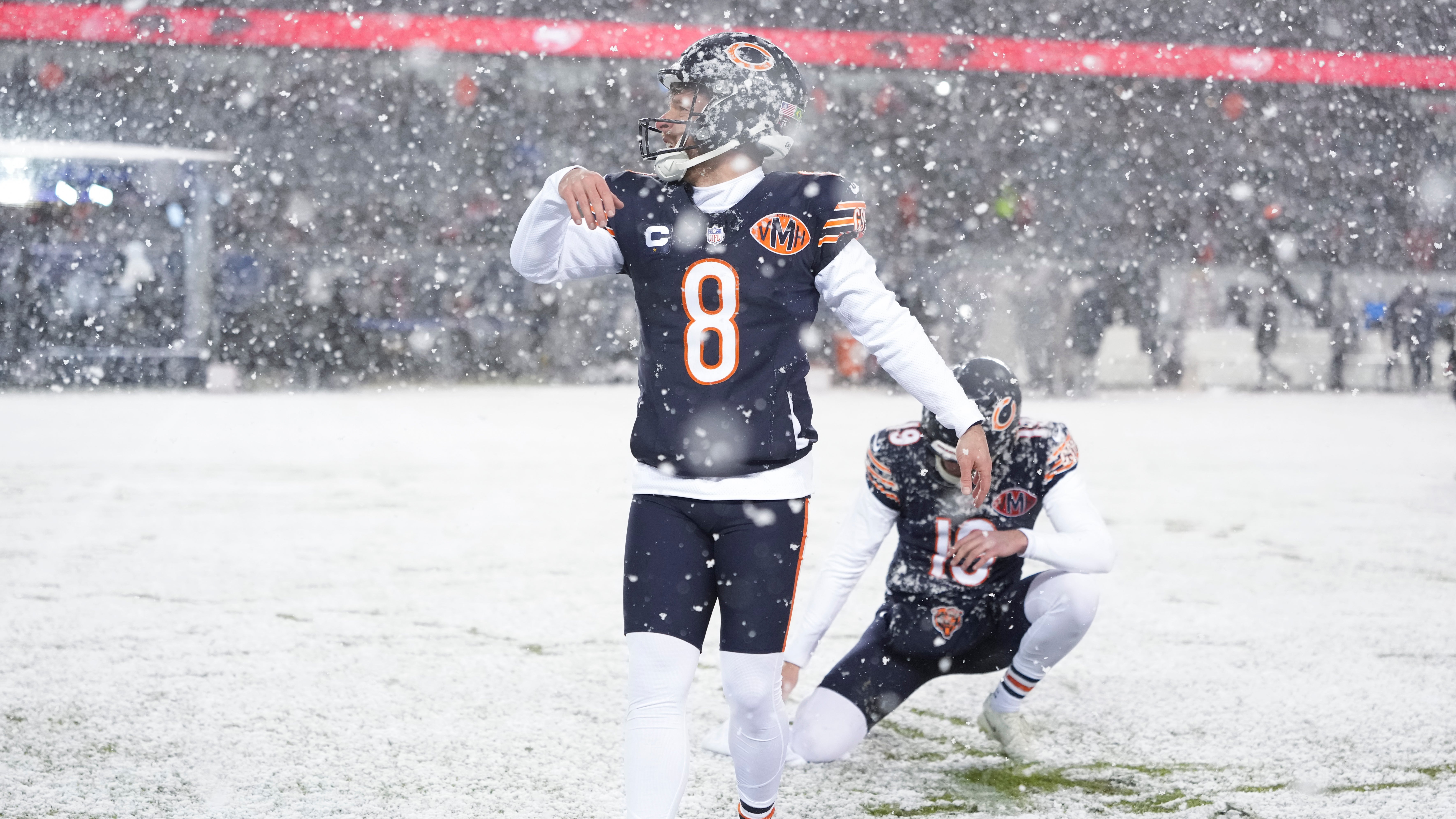 CHICAGO, ILLINOIS - JANUARY 10: Cairo Santos #8 of the Chicago Bears warms up prior to an NFL football Wild Card game against the Green Bay Packers at Solider Field on January 10, 2026 in Chicago, Illinois.