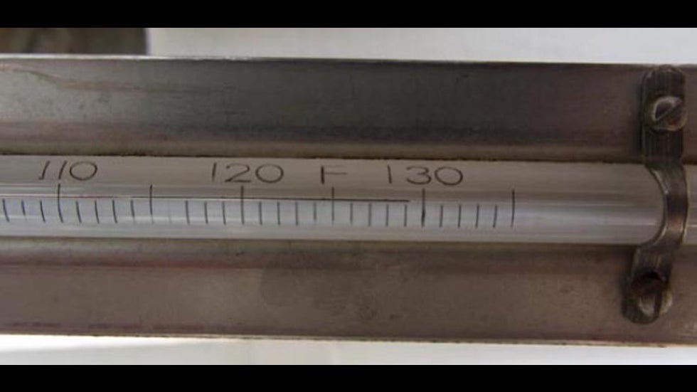 Photo of Death Valley thermometer reading of 129.2°F from 6/30/13