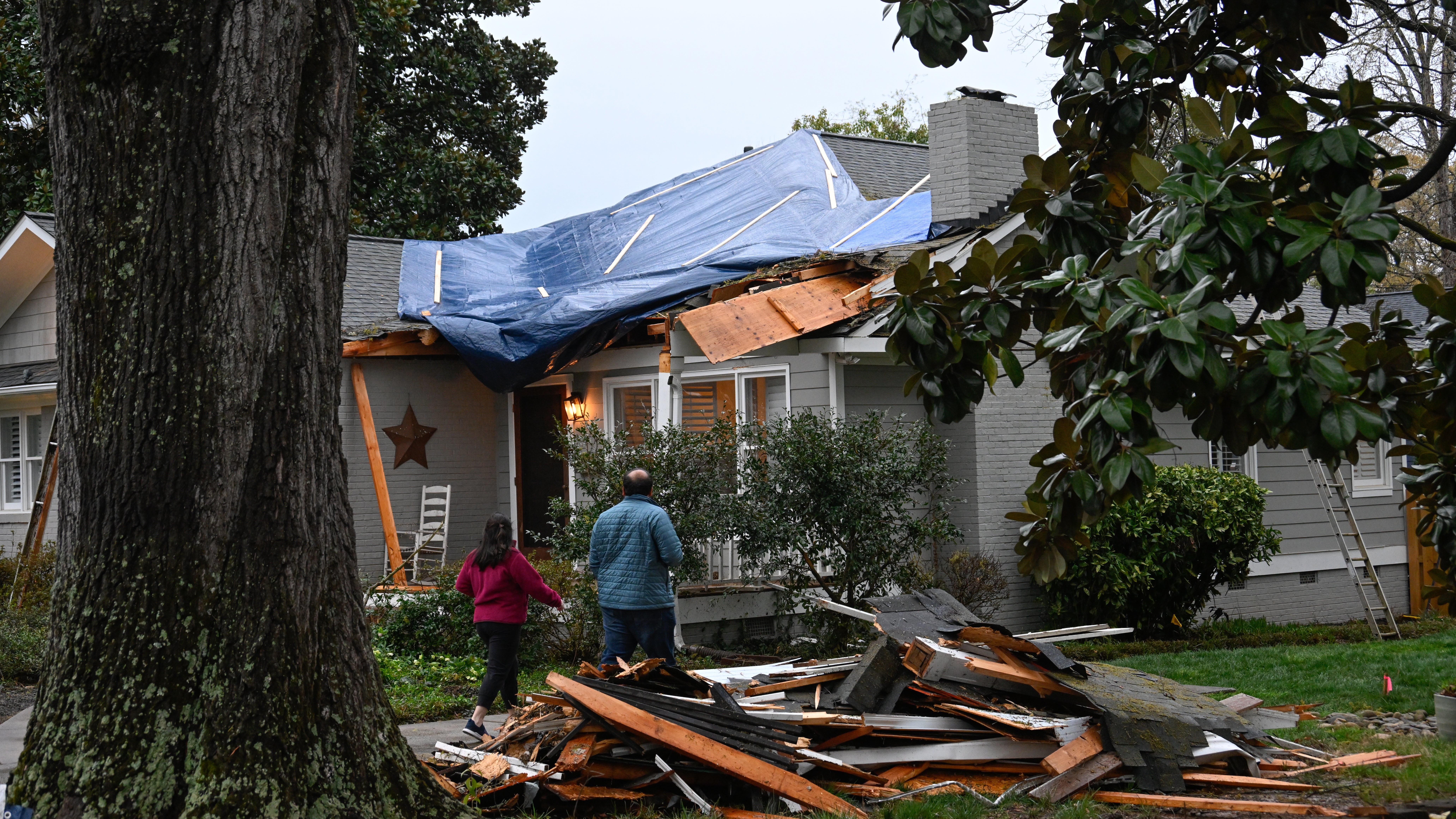 CHARLOTTE, USA - MARCH 16: An EF0 tornado touched down uprooting trees and causing damage to several homes in Charlotte NC, United States on March 16, 2026. (Photo by Peter Zay/Anadolu via Getty Images)