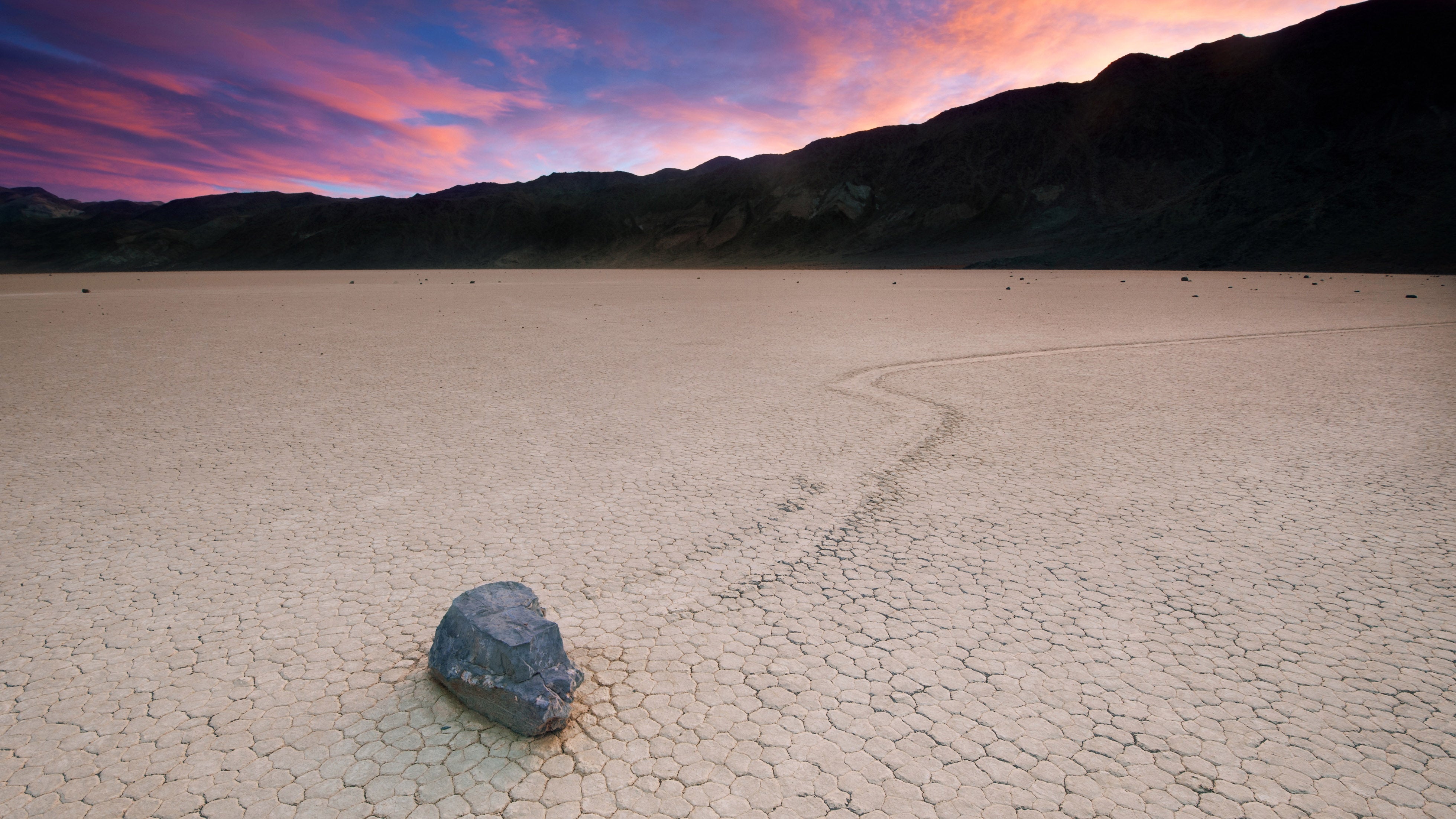 A sailing rock is seen at Racetrack Playa at Death Valley National Park in California. It&rsquo;s believed that rainfall contributes to the stones&rsquo; movements. (Getty Images)