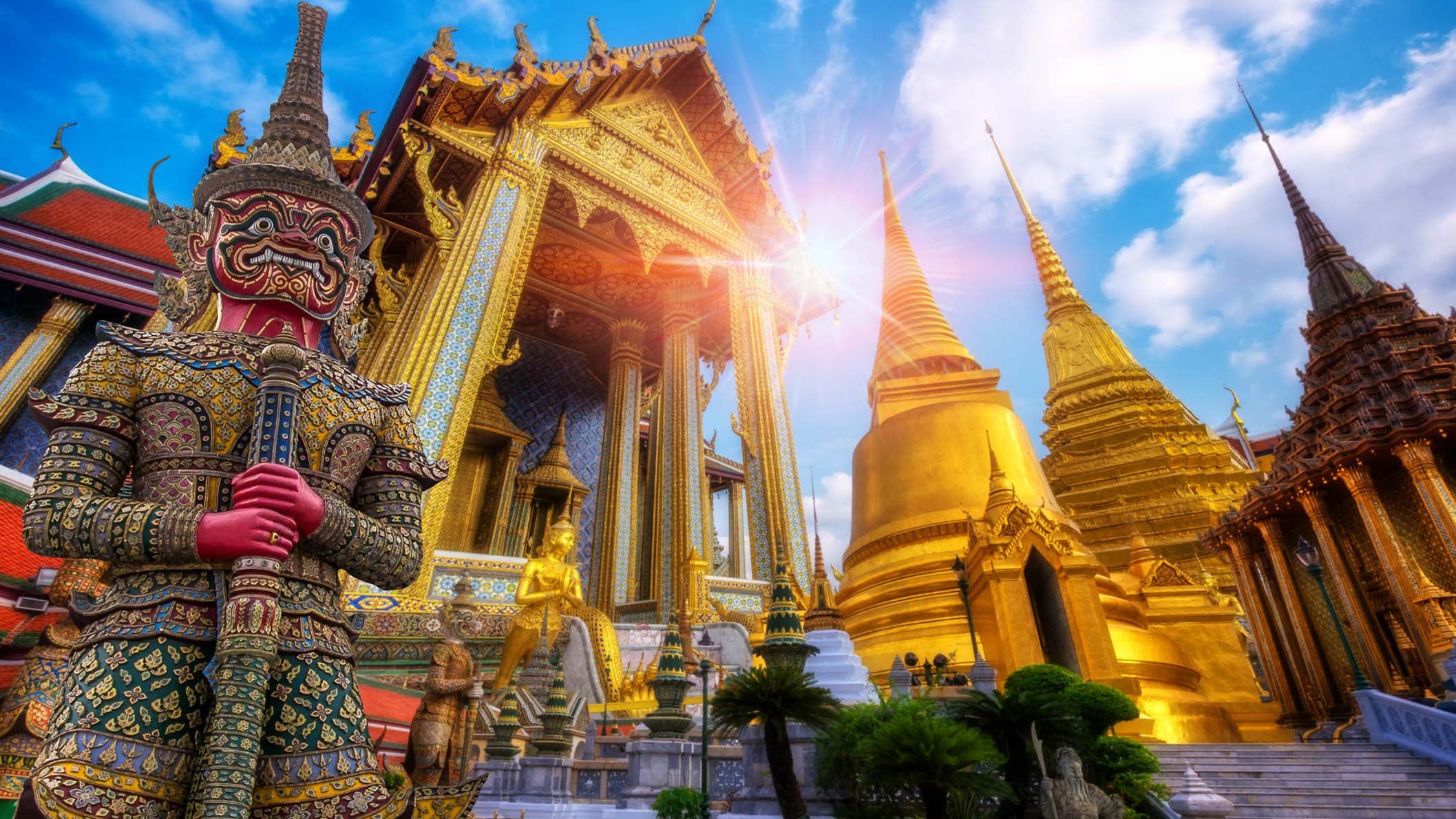 Travel concept, Giant statue at Temple Wat Pra Kaew, Grand Palace, Bangkok Thailand