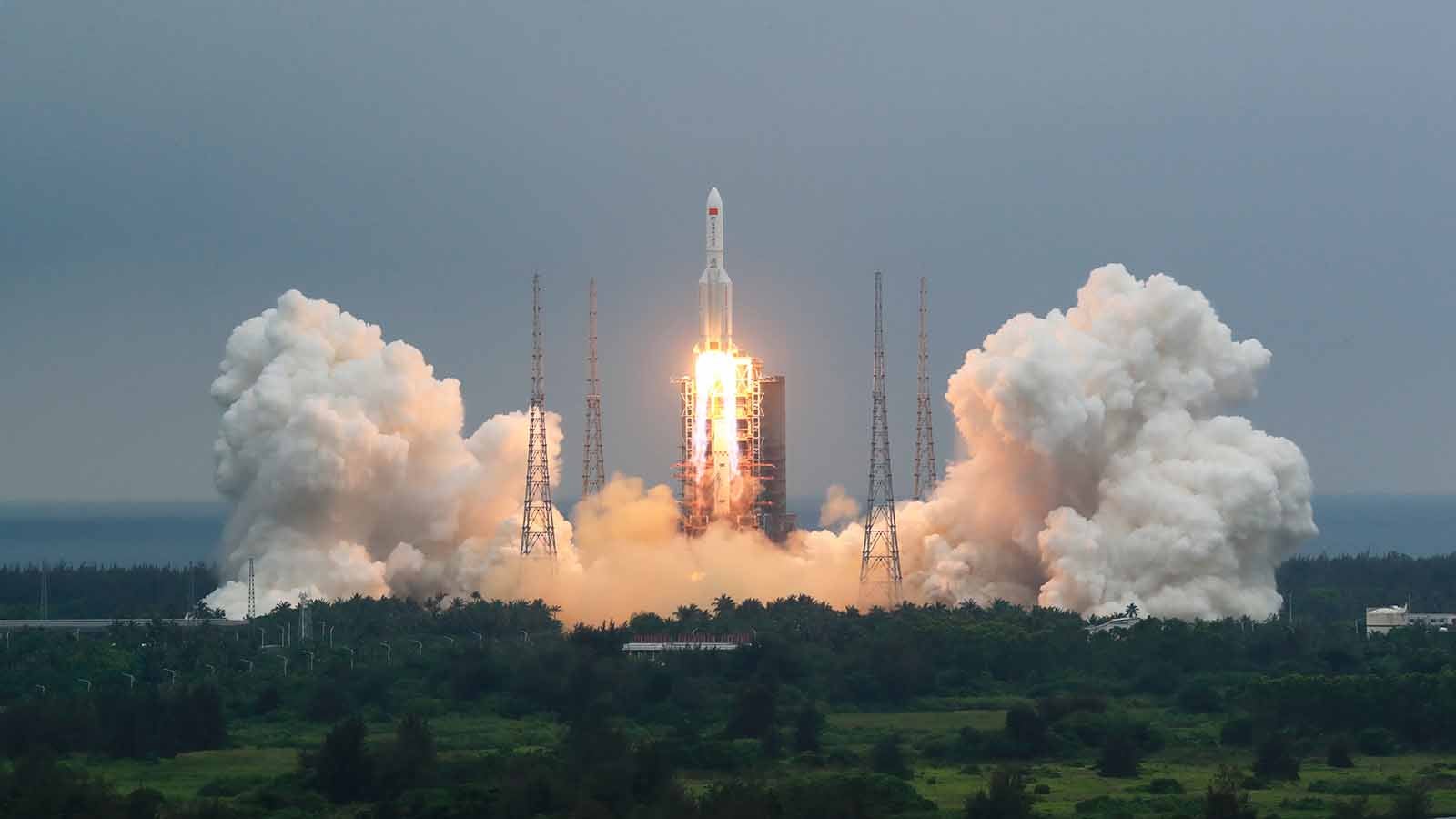 In this photo released by China's Xinhua News Agency, a Long March 5B rocket carrying a module for a Chinese space station lifts off from the Wenchang Spacecraft Launch Site in Wenchang in southern China's Hainan Province, Thursday, April 29, 2021. China has launched the core module on Thursday for its first permanent space station that will host astronauts long-term. (Ju Zhenhua/Xinhua via AP)