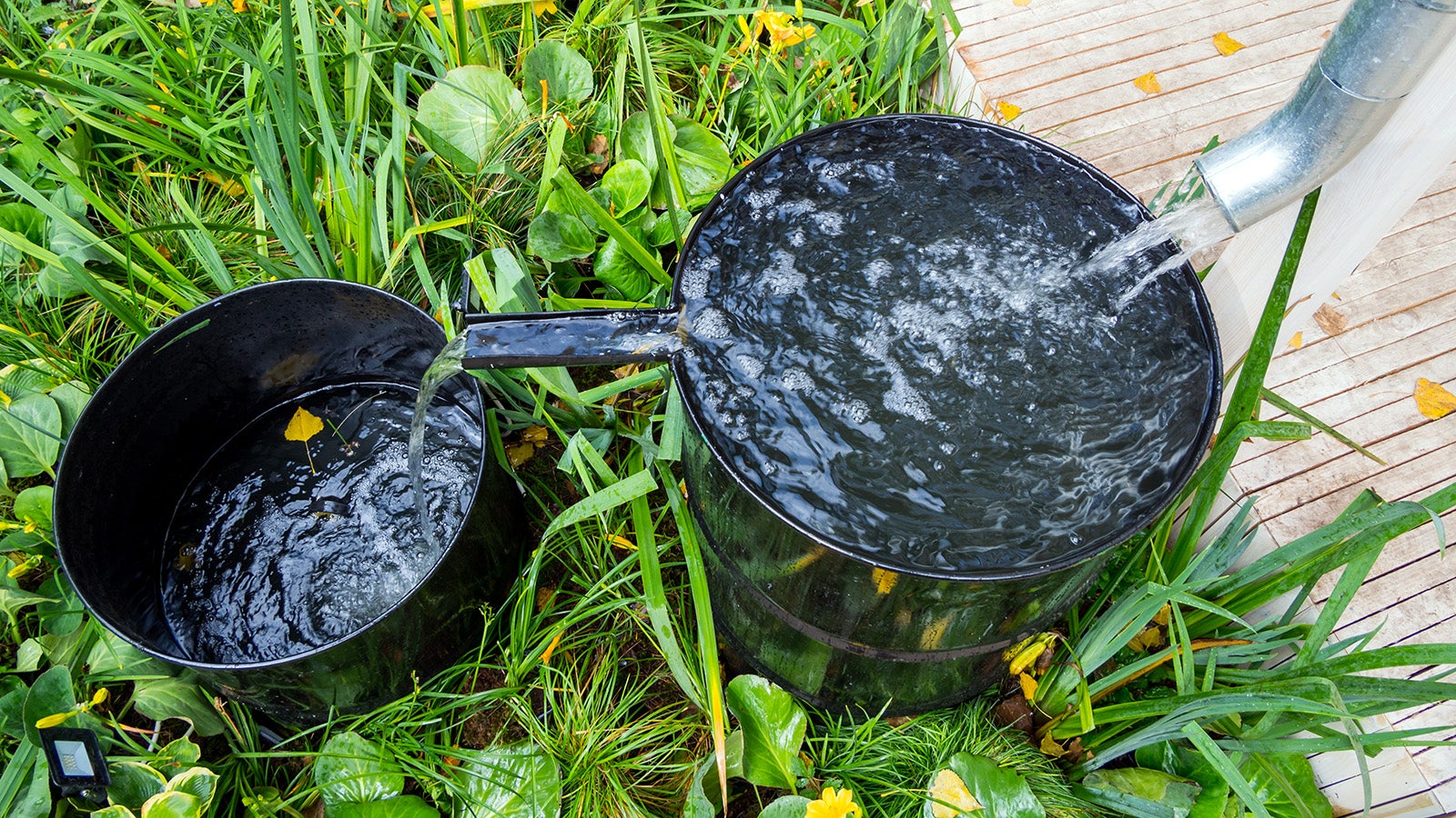 System for collecting rainwater from two barrels