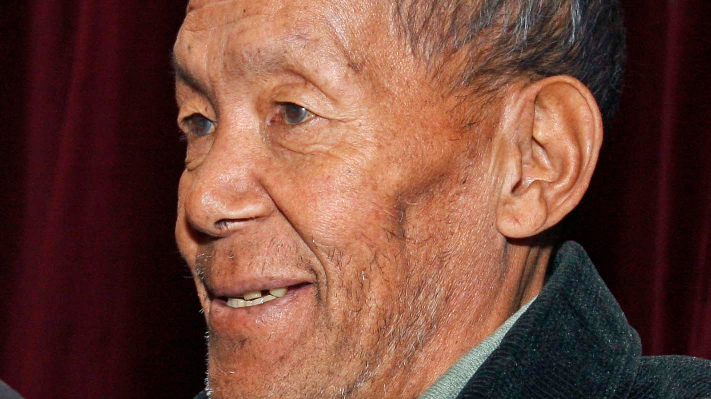 FILE- A Nov. 29, 2009 file photo of Ang Rita Sherpa during a press conference in Katmandu, Nepal. The veteran Nepalese Sherpa guide who was the first person to climb Mount Everest 10 times has died at the age of 72 after a long illness, family members said. (AP Photo/Binod Joshi, File)