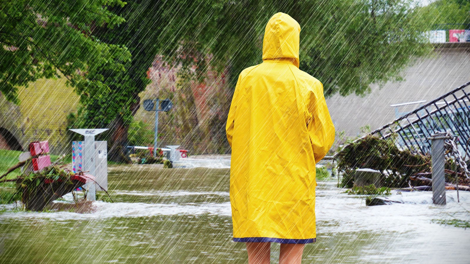 Woman standing in a flooded street