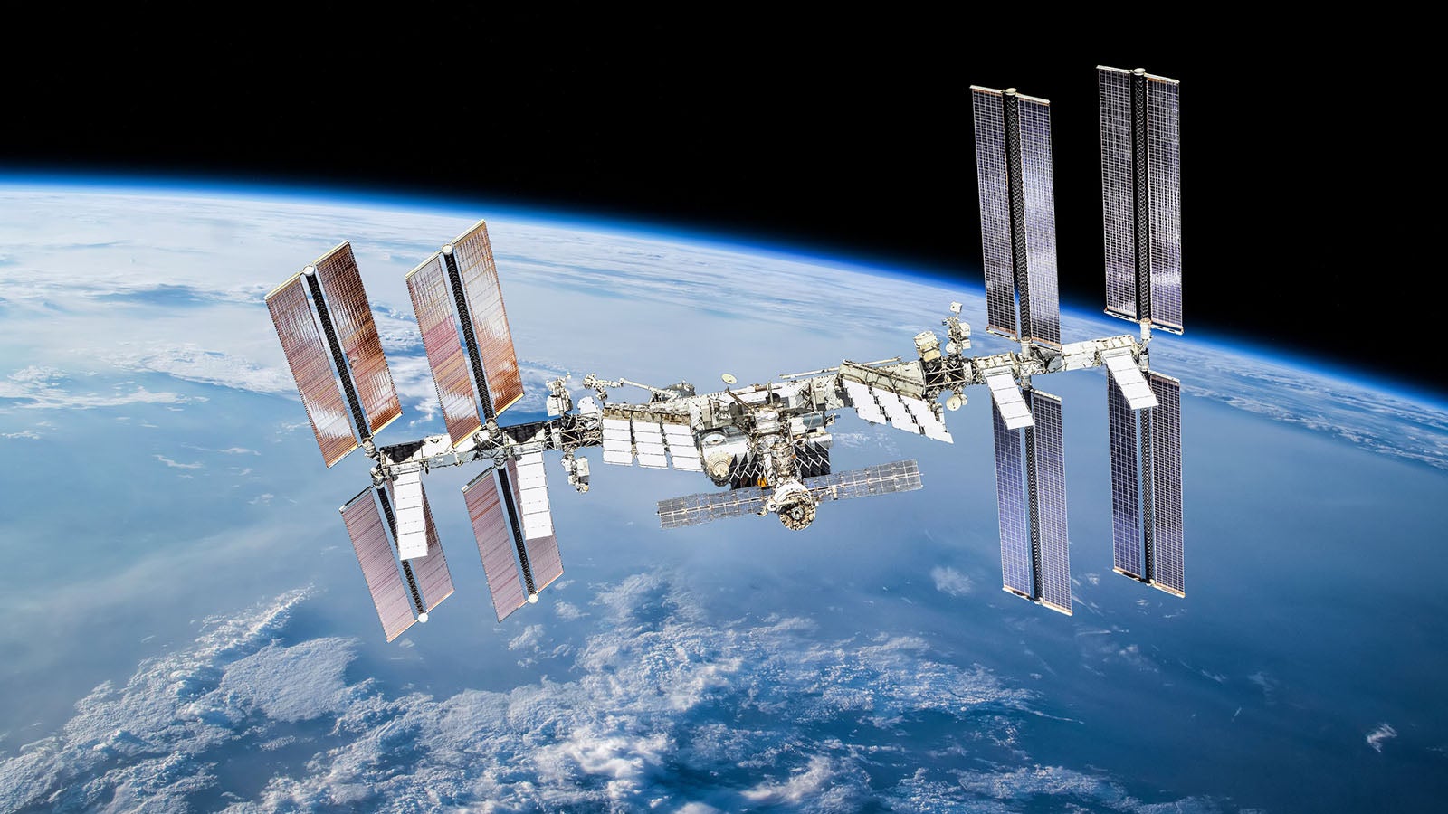 International space station with astronauts. Elements of this image furnished by NASA (url:https://www.nasa.gov/sites/default/files/thumbnails/image/iss060e007297.jpg https://www.nasa.gov/sites/default/files/thumbnails/image/44911459904_375bc02163_k.jpg)