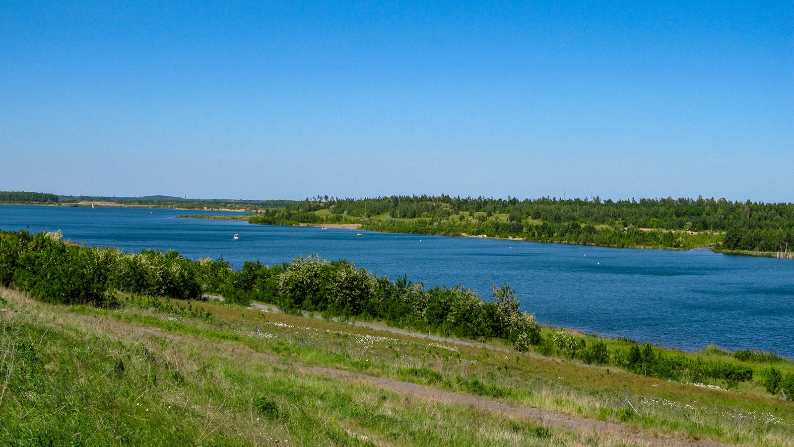 View from Lake Zwenkauer See in the south of Leipzig with wonderful blue waters