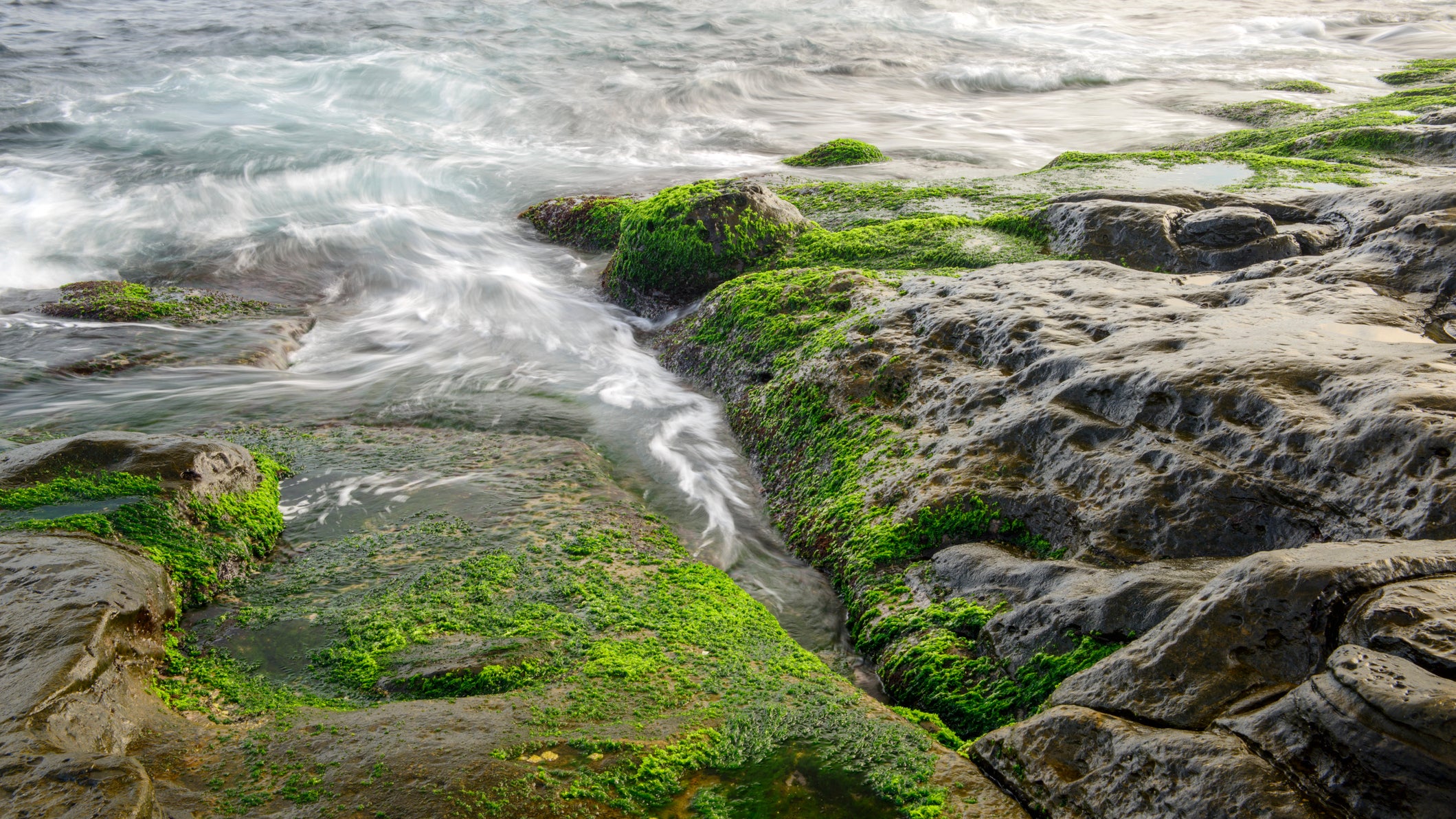 landscape of colorful rocks  with sea wave