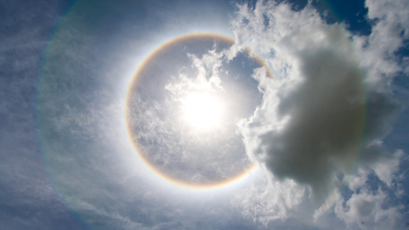Sun with circular rainbow - sun halo