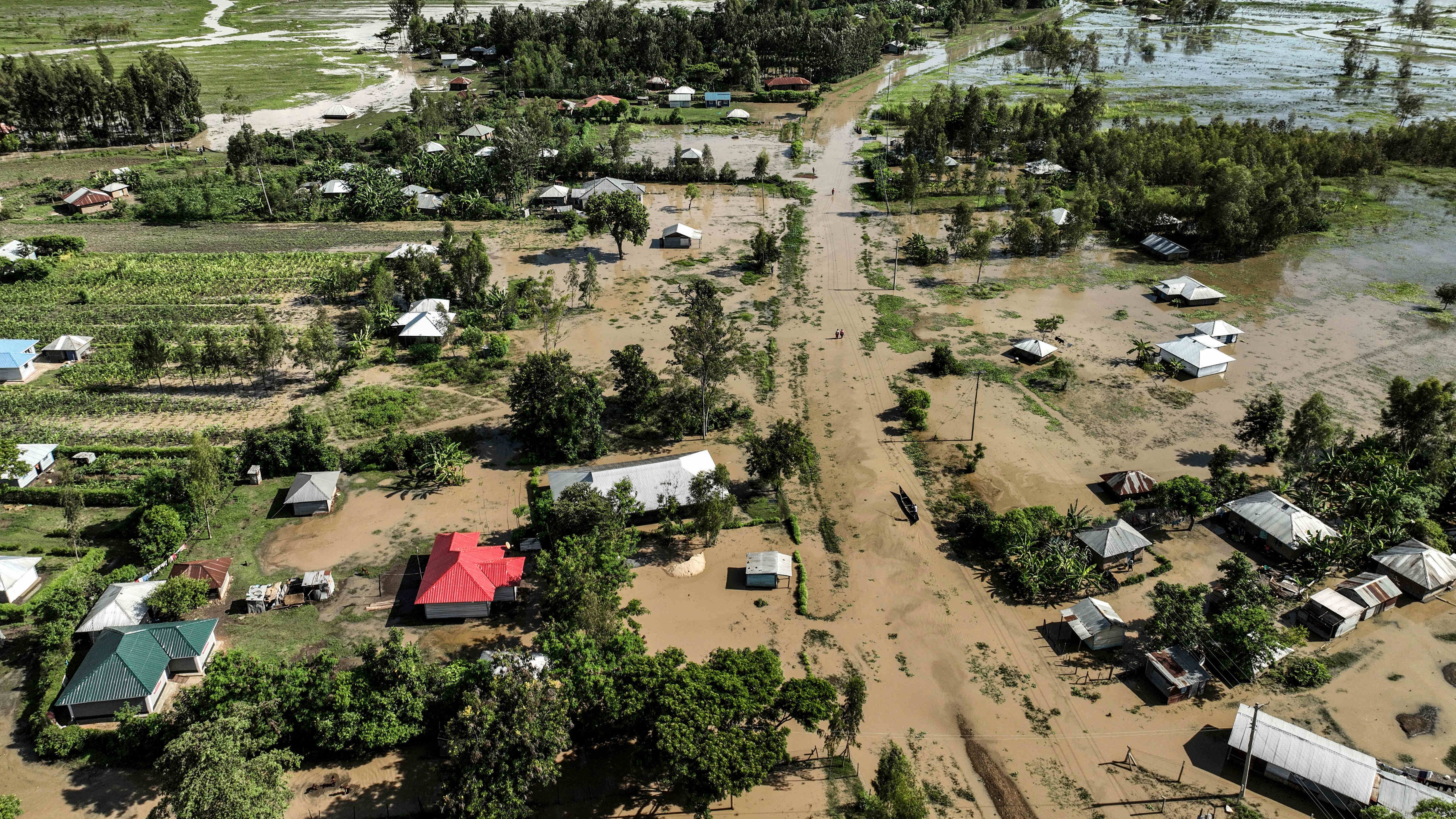 FILE - Floodwaters are visible in Ombaka Village, Kisumu, Kenya, April 17, 2024. Extreme weather events have hit parts of Africa relentlessly in the last three years, with tropical storms, floods and drought causing crises of hunger and displacement. They leave another deadly threat behind them: some of the continent's worst outbreaks of cholera. In southern and East Africa, more than 6,000 people have died and nearly 350,000 cases have been reported since a series of cholera outbreaks began in late 2021. (AP Photo/Brian Ongoro, File)