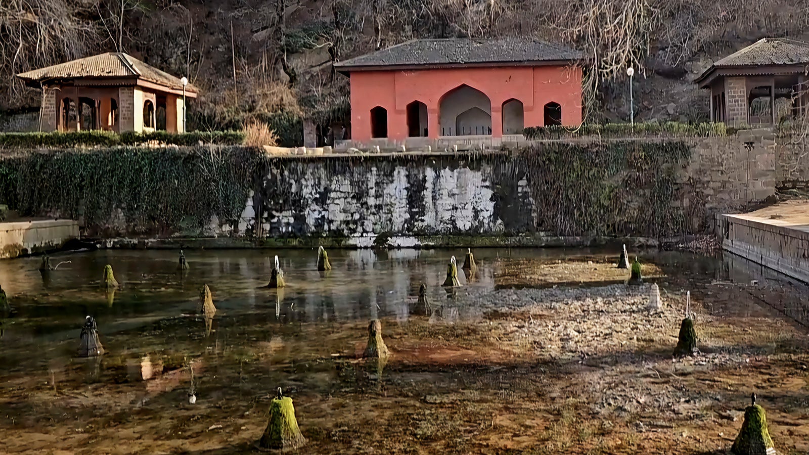 A view of the partially dried-up pond after the main spring dried up inside the Achabal Mughal Garden in Anantnag south of Srinagar, Indian controlled Kashmir, Monday, Feb. 17, 2025. (AP Photo/Hilal Ahmed Shah)