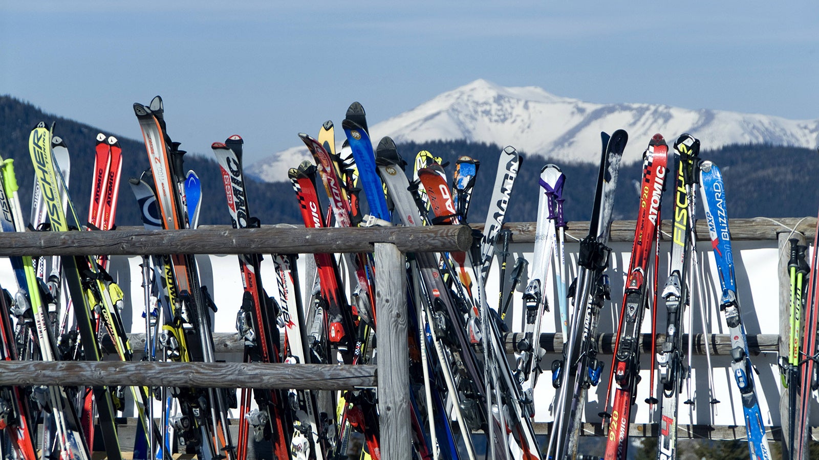 abgestellte Skier an Hozzaun, Oesterreich, Steiermark skis leaned against a wooden fence, Austria, Styria BLWS157885Seconded Skis to  Austria Styria Skis canned against a Wooden Fence Austria Styria BLWS157885