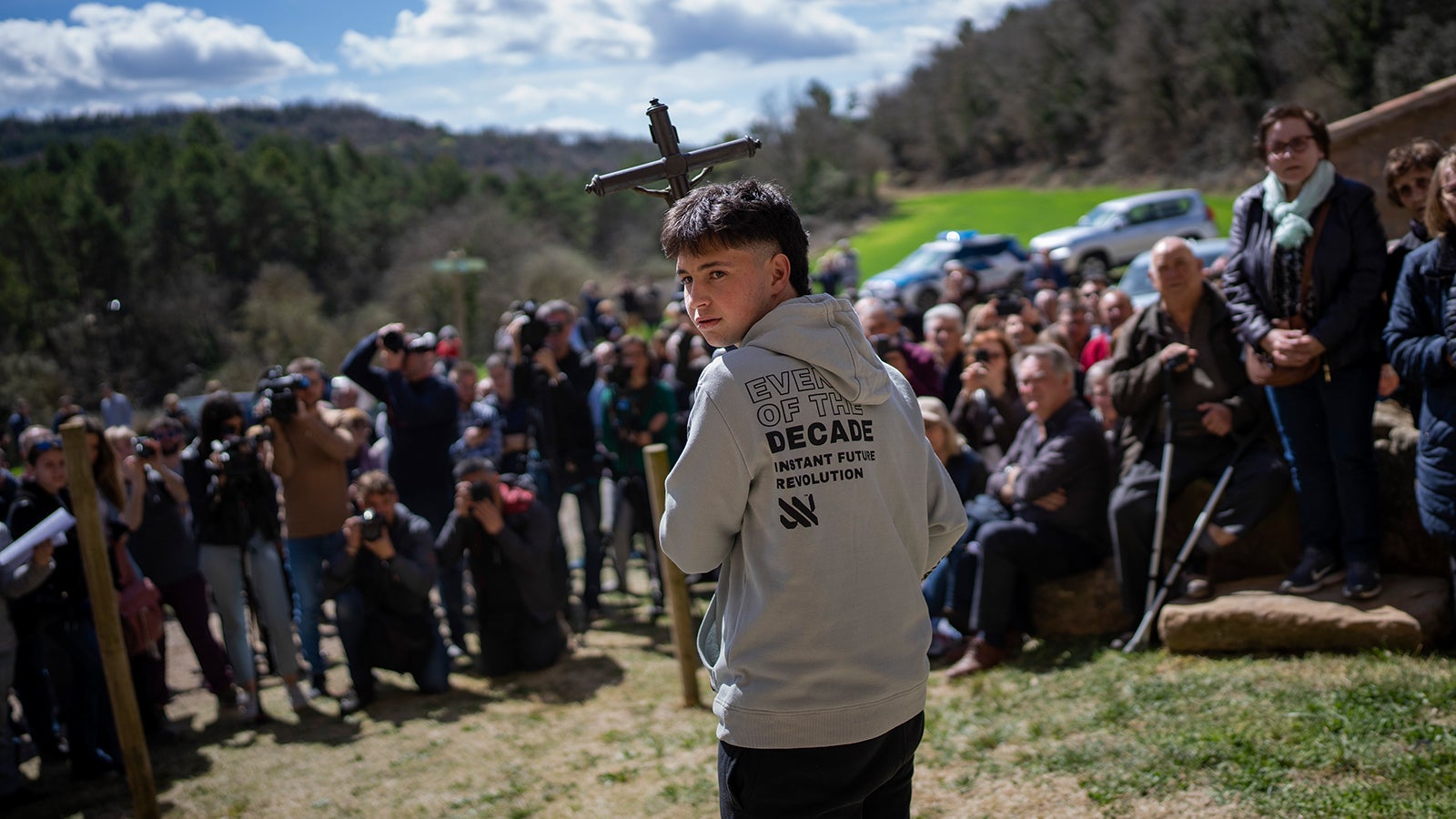 Local residents take part in a procession carrying a replica of the Our Lady of the Torrents, a virgin historically associated with drought in l'Espunyola, north of Barcelona, Spain, Sunday, March 26, 2023. Farmers and parishioners gathered Sunday at the small hermitage of l'Espunyola, a rural village in Catalonia, to attend a mass asking the local virgin Our Lady of the Torrents for rain. Prayers and hymns were offered to ask for divine intervention in solving the earthly crisis. (AP Photo/Emilio Morenatti)