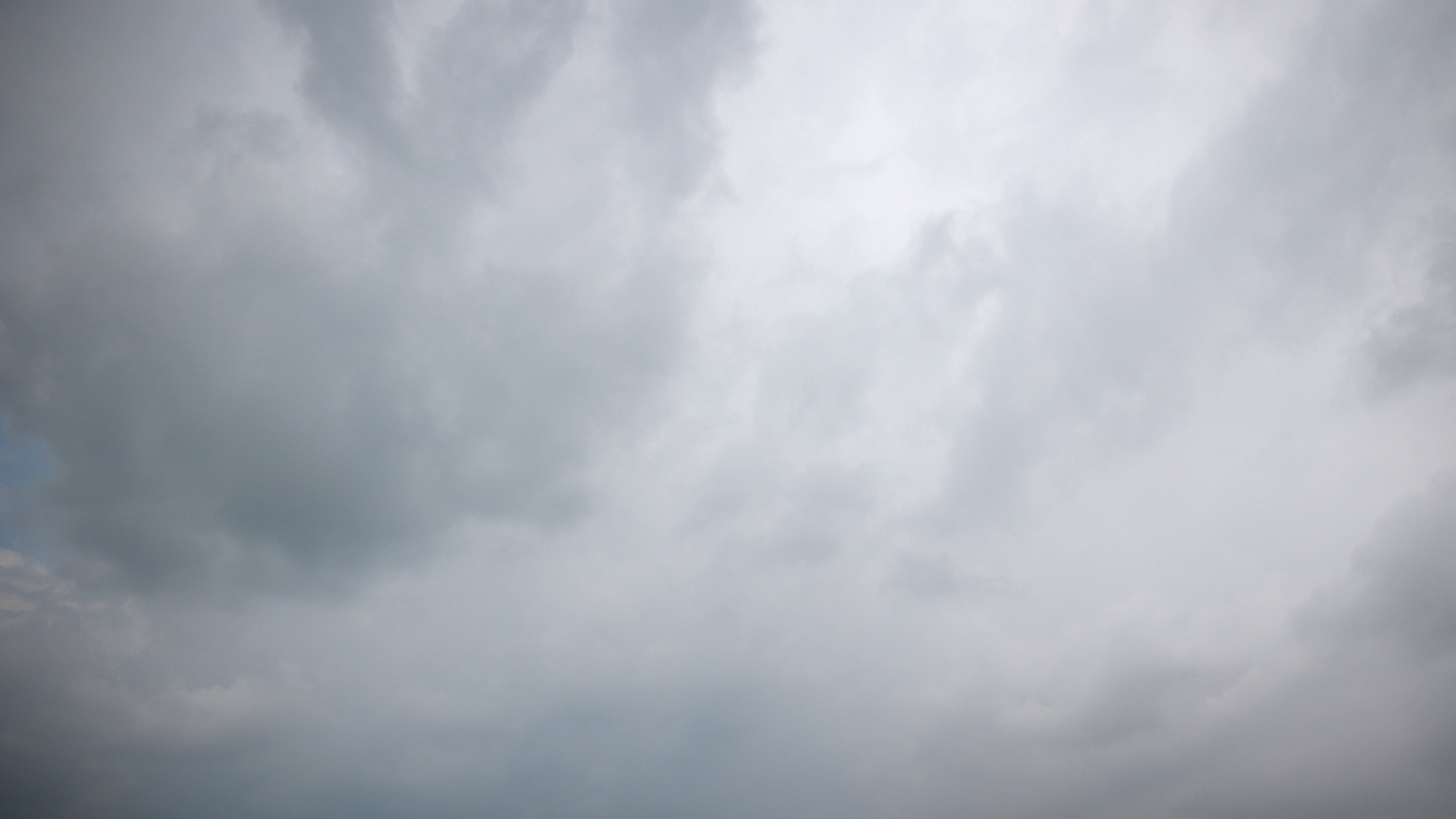 Dark clouds loom over a camp for the internally displaced on the beach near the Nuseirat refugee in the central Gaza Strip on December 20, 2024, amid the continuing war between Israel and Hamas. (Photo by Eyad BABA / AFP) (Photo by EYAD BABA/AFP via Getty Images)