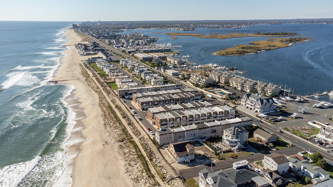 Sea Bright, N.J., looking south is seen from an aerial perspective in 2022. The new seawall can be seen between the sand and the buildings. (Liz Roll/weather.com)