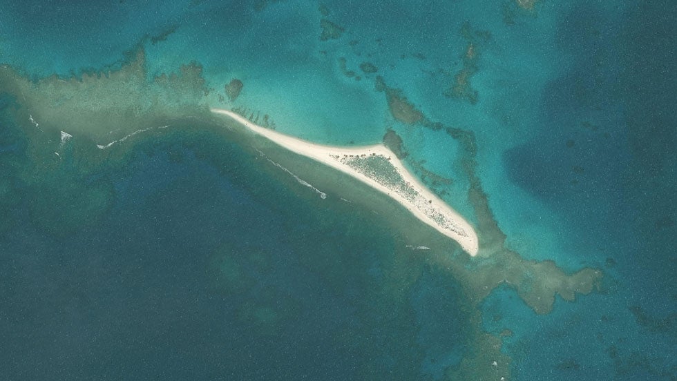 This satellite image shows East Island in the French Frigate Shoals before Hurricane Walaka wiped it off the map. The same hurricane decimated a coral reef in the region. (U.S. Fish and Wildlife Service)
