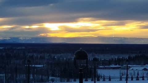 A fata morgana, highlighted by the white arrows, is seen in Fairbanks, Alaska, on January 15, 2018. (NWS-Fairbanks)