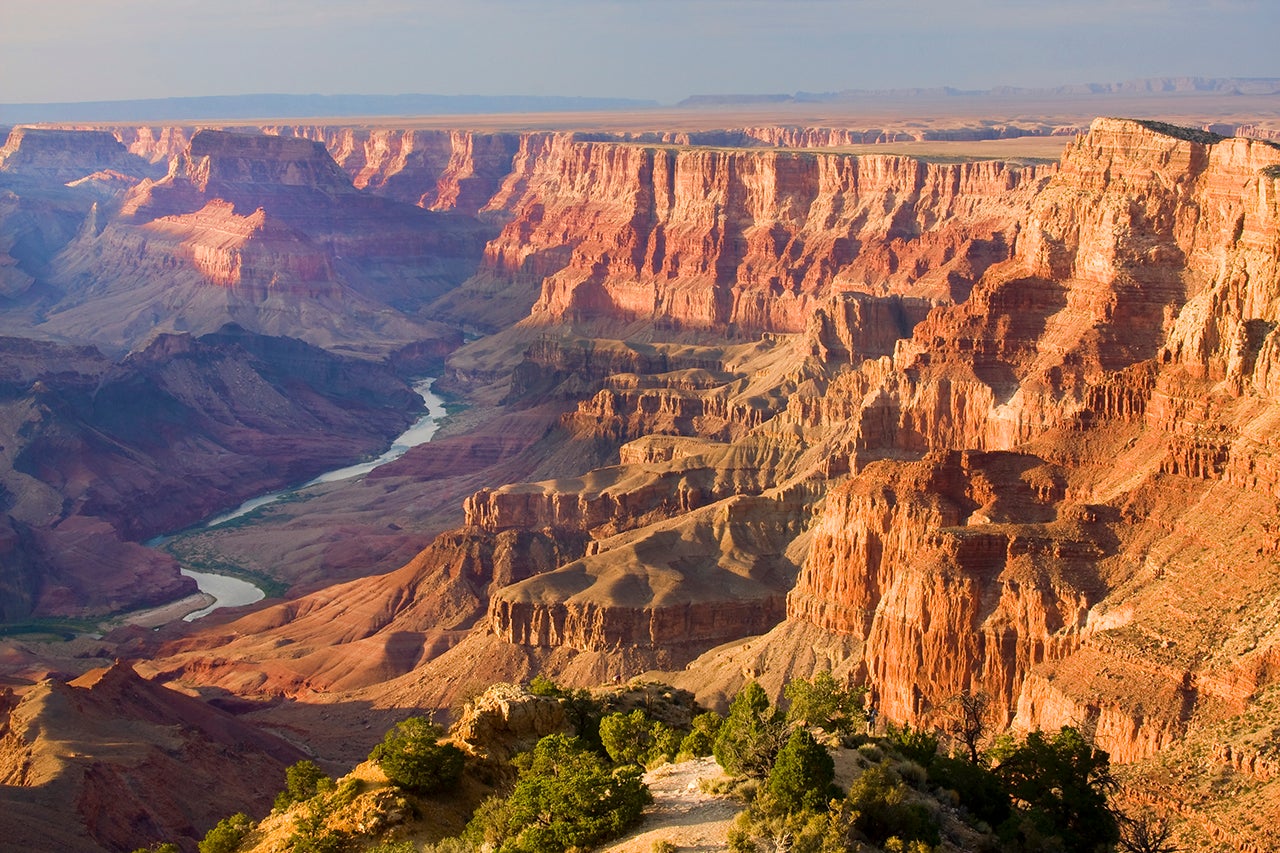 Take in the Grand Canyon from the west rim, with gorgeous views of the Colorado River, when you take this full-day bus tour from Las Vegas. (Getty Images)