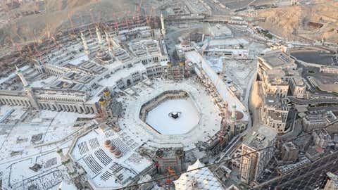 An aerial view shows an empty white-tiled area surrounding the Kaaba in Mecca's Grand Mosque, on March 6, 2020. An eerie emptiness enveloped the sacred Kaaba in Mecca's Grand Mosque, Islam's holiest site, where attendance at Friday prayers was hit by measures to protect against the deadly new coronavirus. (Bandar Aldandani/AFP via Getty Images)