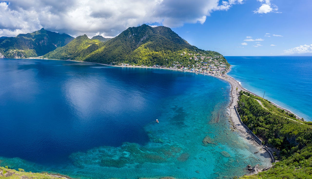 Scotts Head Village, Dominica, is seen on the far side of the island. On left side is the Caribbean Sea, on the right side is the Atlantic Ocean. (Derek Galon via Getty Images)