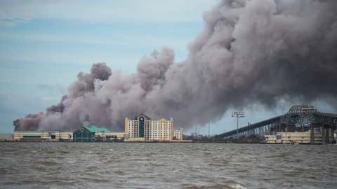 Smoke rises from a burning chemical plant after the passing of Hurricane Laura in Lake Charles, La., on Aug. 27, 2020. (Andrew Caballero-Reynolds/AFP via Getty Images)