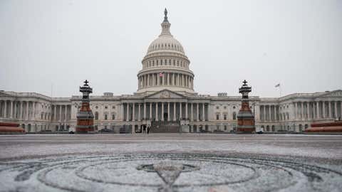 The U.S. Capitol is seen as a snow storm develops in Washington, D.C., on Dec. 16, 2020. (Andrew Caballero-Reynolds/AFP via Getty Images)