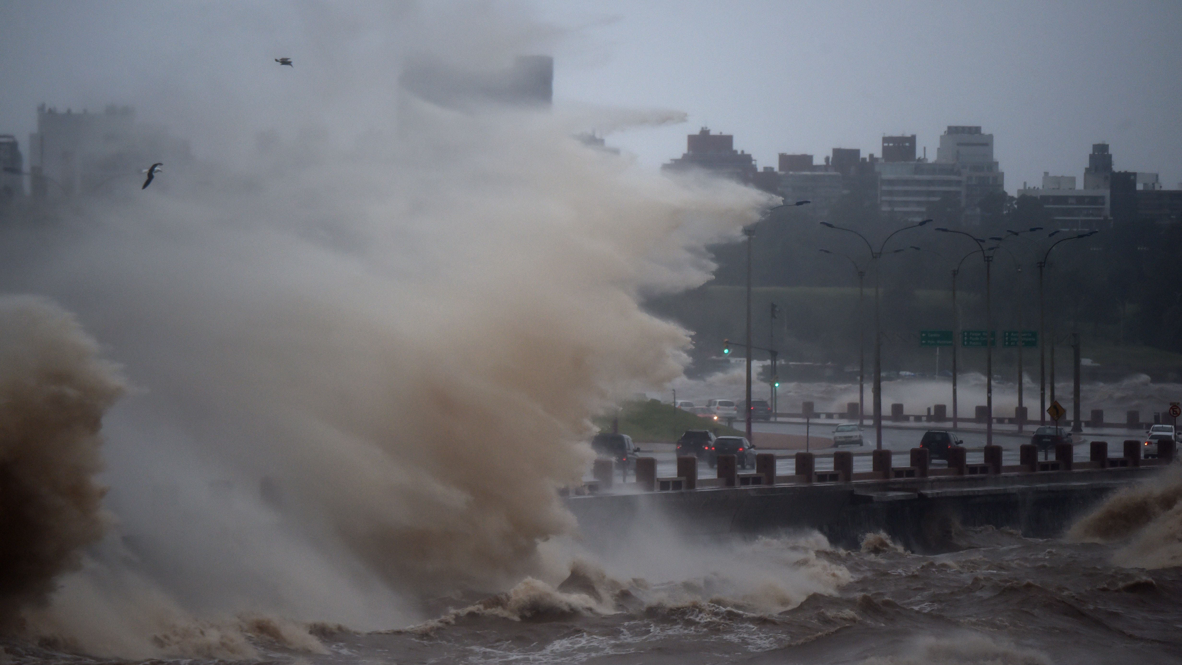 Waves crash over Montevideo's Rambla in Uruguay during the passage of a subtropical cyclone on May 17, 2022. (Pablo Porciuncula/AFP via Getty Images)