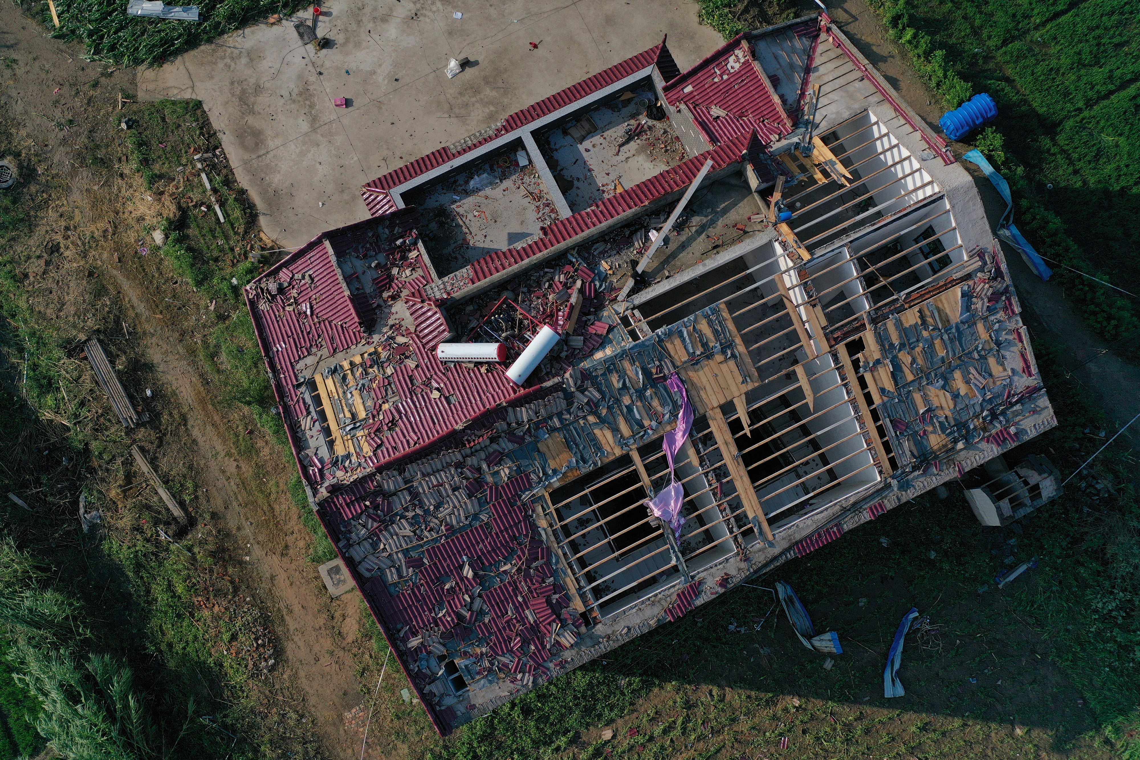 Damaged houses are seen from above after a tornado struck Yancheng in eastern China&rsquo;s Jiangsu Province, July 21, 2022. Many areas in China saw tornadoes on July 20, including an EF-3 in Yancheng Xiangshui. (CFOTO/Future Publishing via Getty Images)
