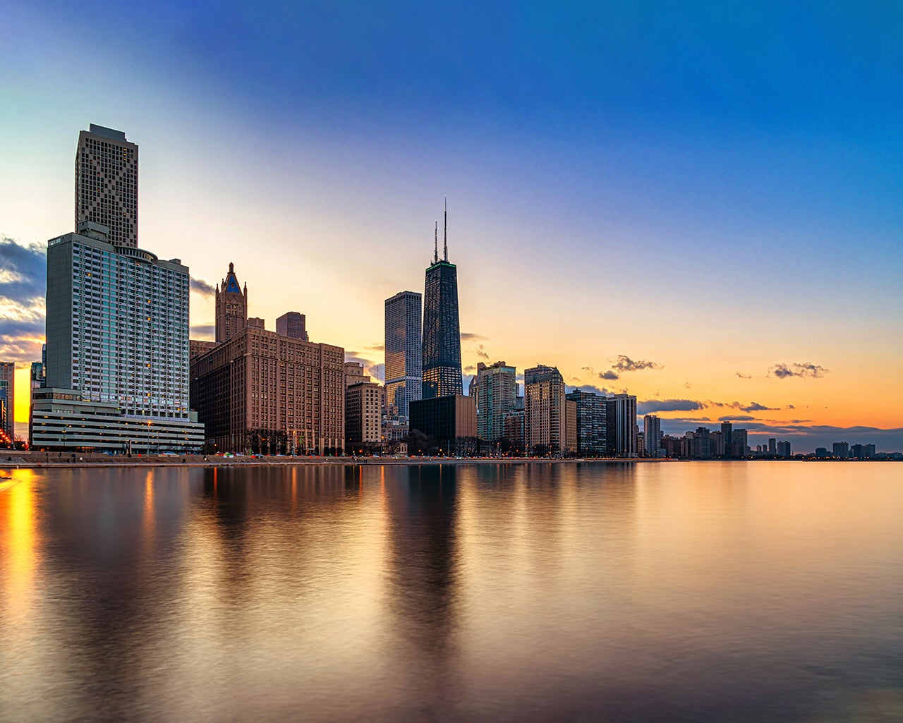 Learn about Chicago&rsquo;s most important buildings and view them by boat on the Chicago Architecture River Cruise. (Inverse Couple Images via Getty Images)