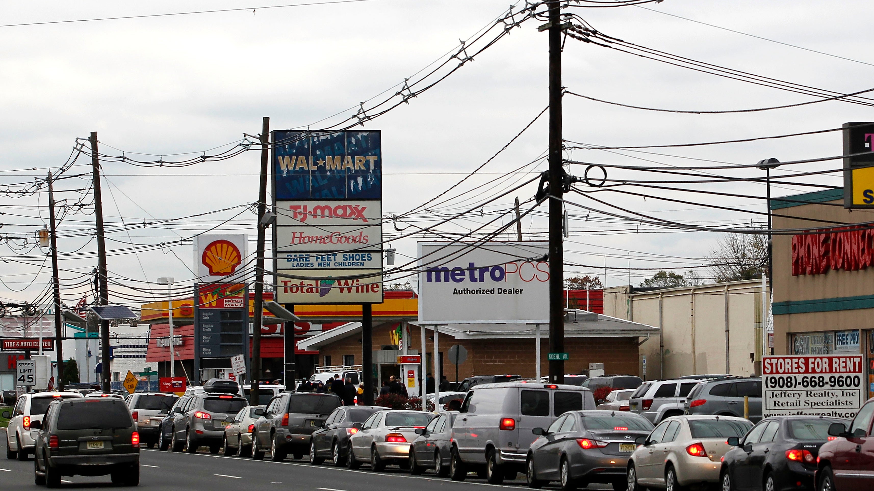 Customers line up to refill cars and gasoline tanks along Route 22, on Oct. 31, 2012, in Union, N.J. Though nearly lined with gas stations, only two on the highway had both electricity and fuel to dispense as residents continued to cope with widespread damage and region-wide power outages resulting from Superstorm Sandy. (Jeff Zelevansky/Getty Images)