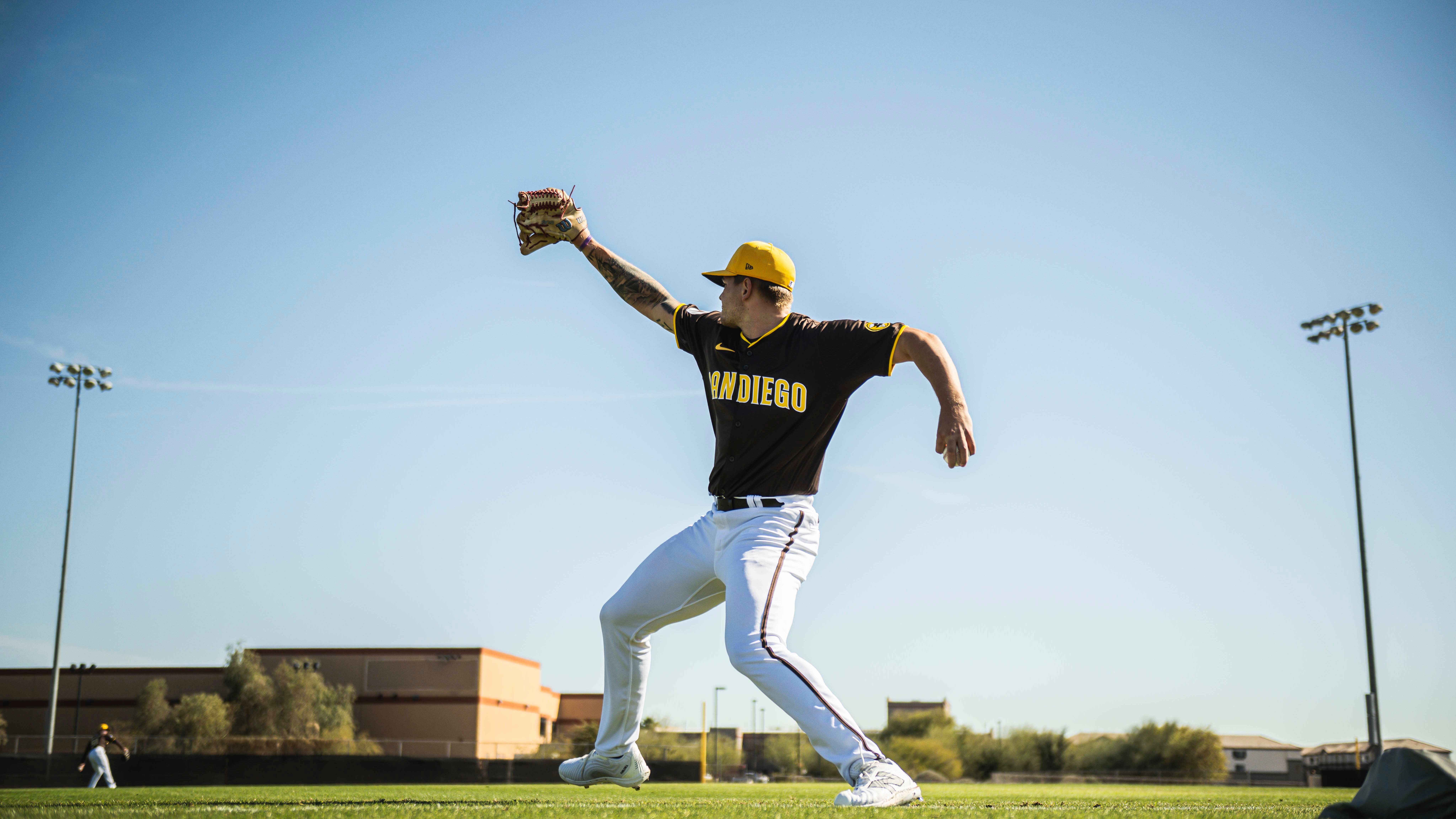 PEORIA, ARIZONA - FEBRUARY 12: Robby Snelling #93 of the San Diego Padres throws during the daily workout at Peoria Sports Complex on February 12, 2024 in Peoria, Arizona. (Photo by Matt Thomas/San Diego Padres/Getty Images)