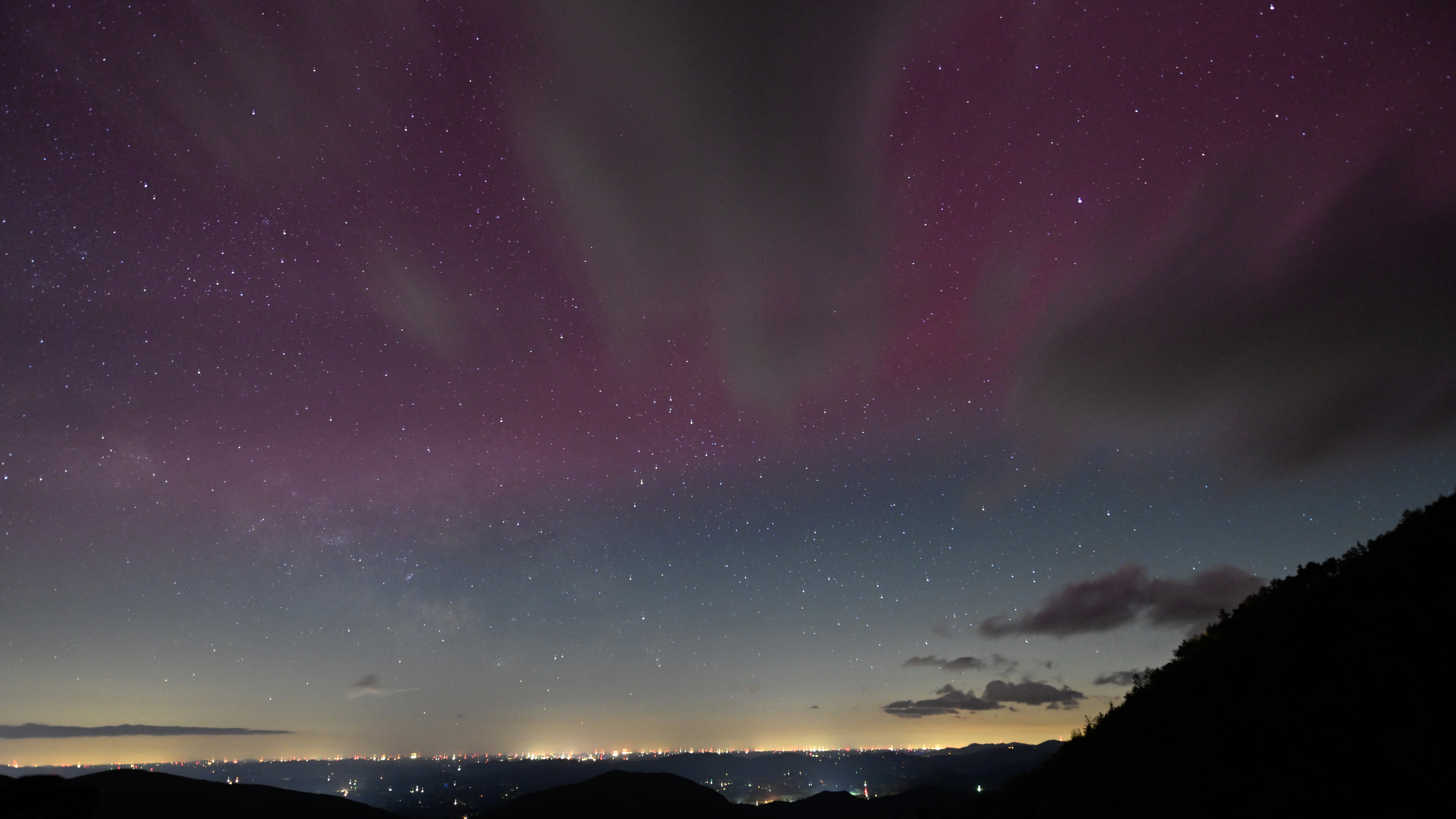 MOUNT MITCHELL, UNITED STATES - MAY 10: Unusual sun activity created a G5 Geostorm on Earth sparks northern lights (Aurora Borealis) in Mount Mitchell, North Carolina, United States on May 10, 2024. (Photo by Peter Zay/Anadolu via Getty Images)