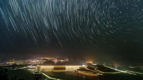 YICHANG, CHINA - AUGUST 11, 2024 - Star Trails are visible above the Three Gorges Dam in Yichang, Hubei province, China, August 11, 2024. (Photo credit should read CFOTO/Future Publishing via Getty Images)