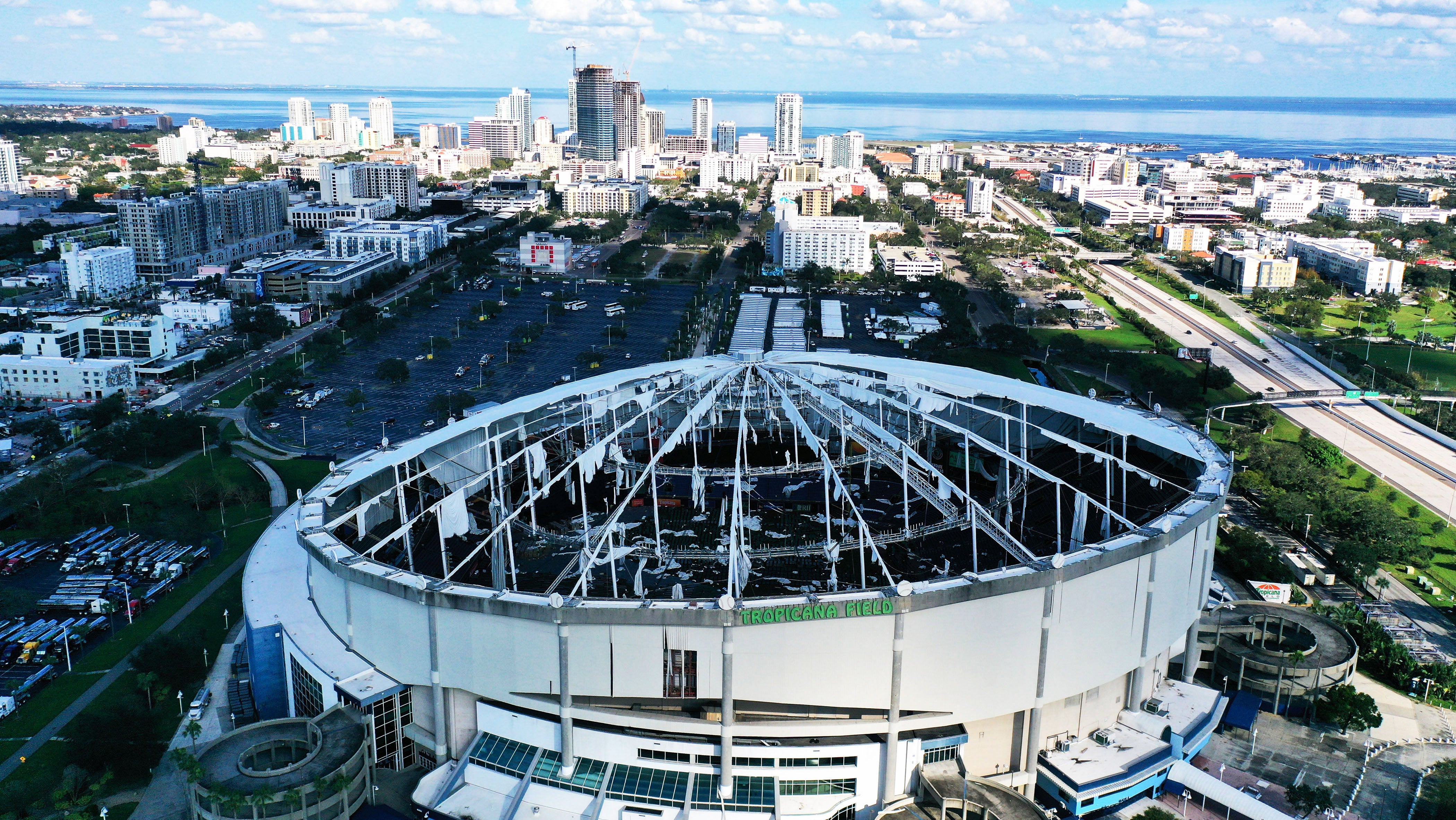 CHIMCHIME, ST  PETERSBURG, FLORIDA, UNITED STATES - 2024/10/13: (EDITORS NOTE: Image taken with drone) In this aerial view, the domed roof at Tropicana Field, the home of the Tampa Bay Rays, is seen ripped to shreds from Hurricane Milton&iacute;s powerful winds in St. Petersburg. The storm passed through the area on October 10, 2024, making landfall as a Category 3 hurricane in Siesta Key, Florida. (Photo by Paul Hennessy/SOPA Images/LightRocket via Getty Images)