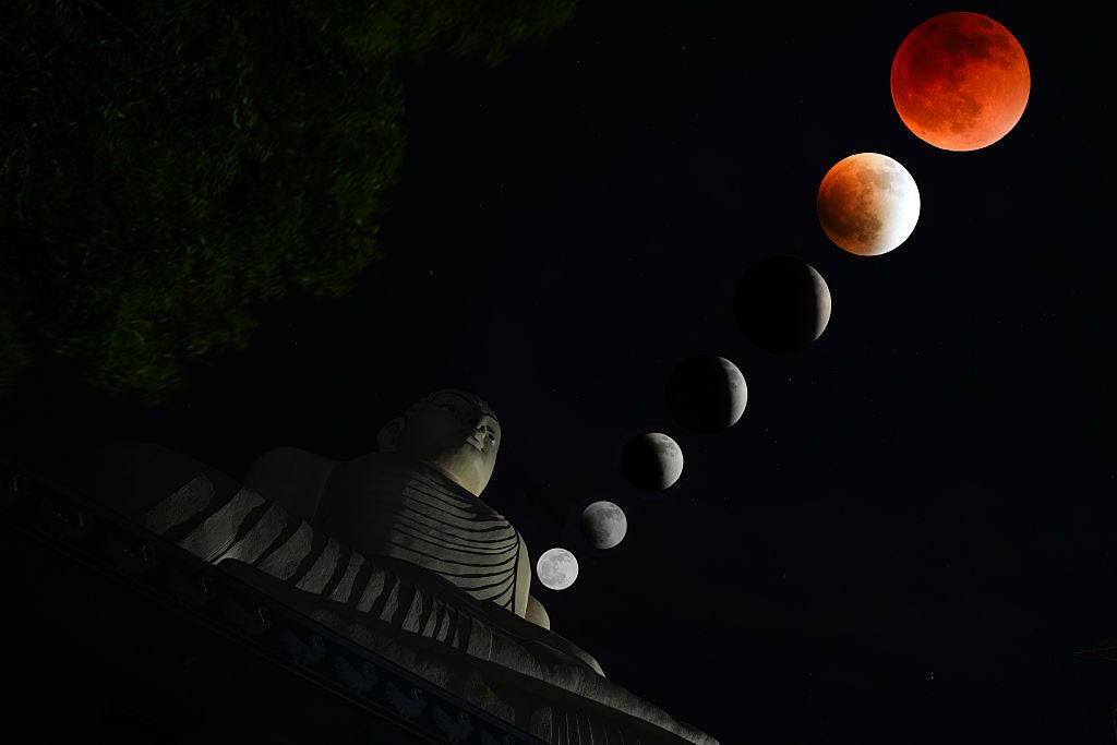 A composite of seven images shows all stages of the penumbral and partial lunar eclipse in Balangoda, Sri Lanka, on September 7, 2025. (Photo by Thilina Kaluthotage/NurPhoto via Getty Images)