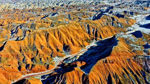 Weather Of The World: November 24 - 30 14 Zhangye, China - November 24, 2025 - Snow scenery of Danxia Tourist Scenic Area in Zhangye city, Gansu province, China on November 24, 2025. (Photo credit should read CPHOTO/Future Publishing via Getty Images)