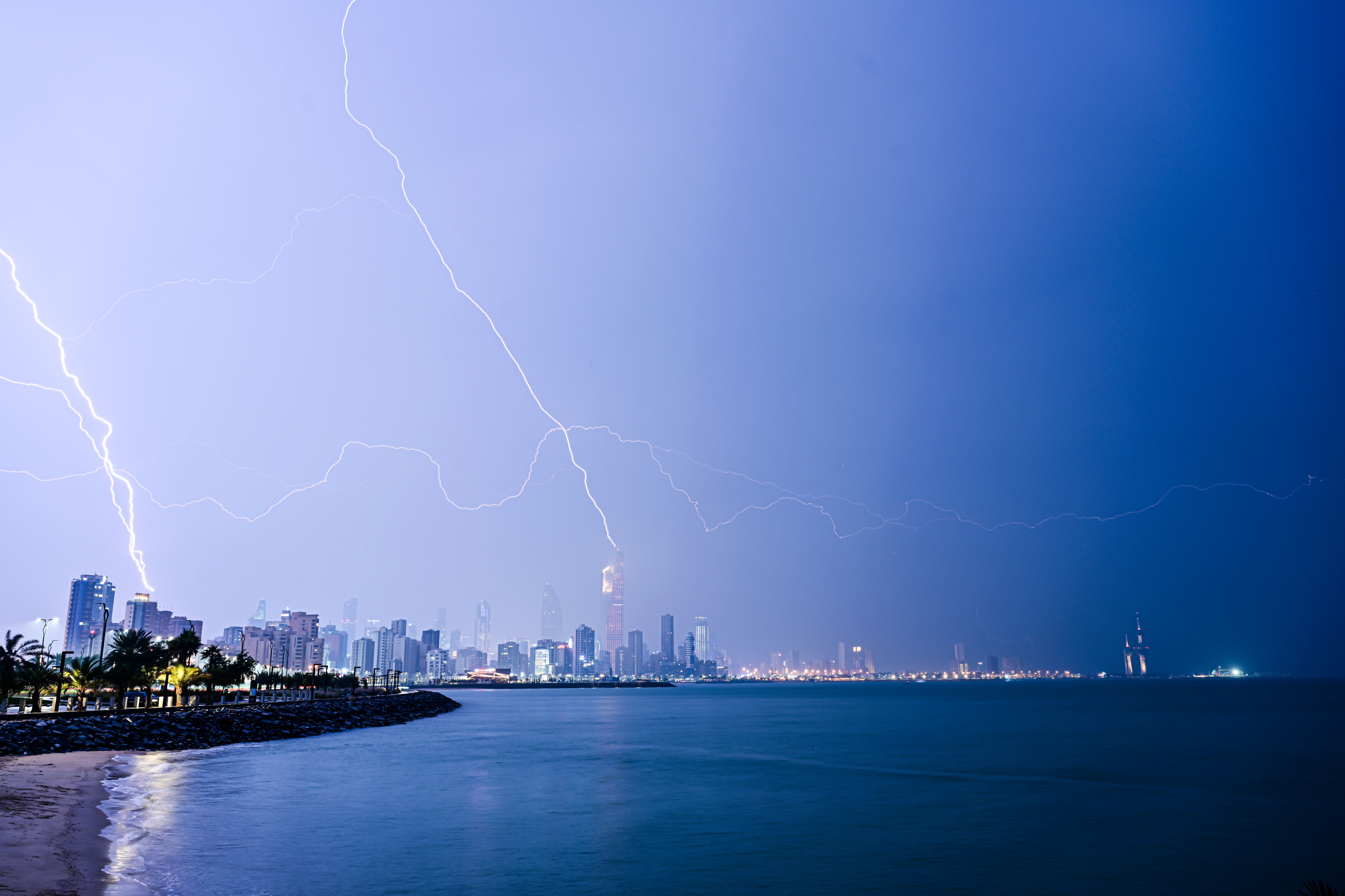 This photo taken on Dec. 10, 2025 shows the lightning over the skyline of Kuwait City, Kuwait. (Photo by Asad/Xinhua via Getty Images)